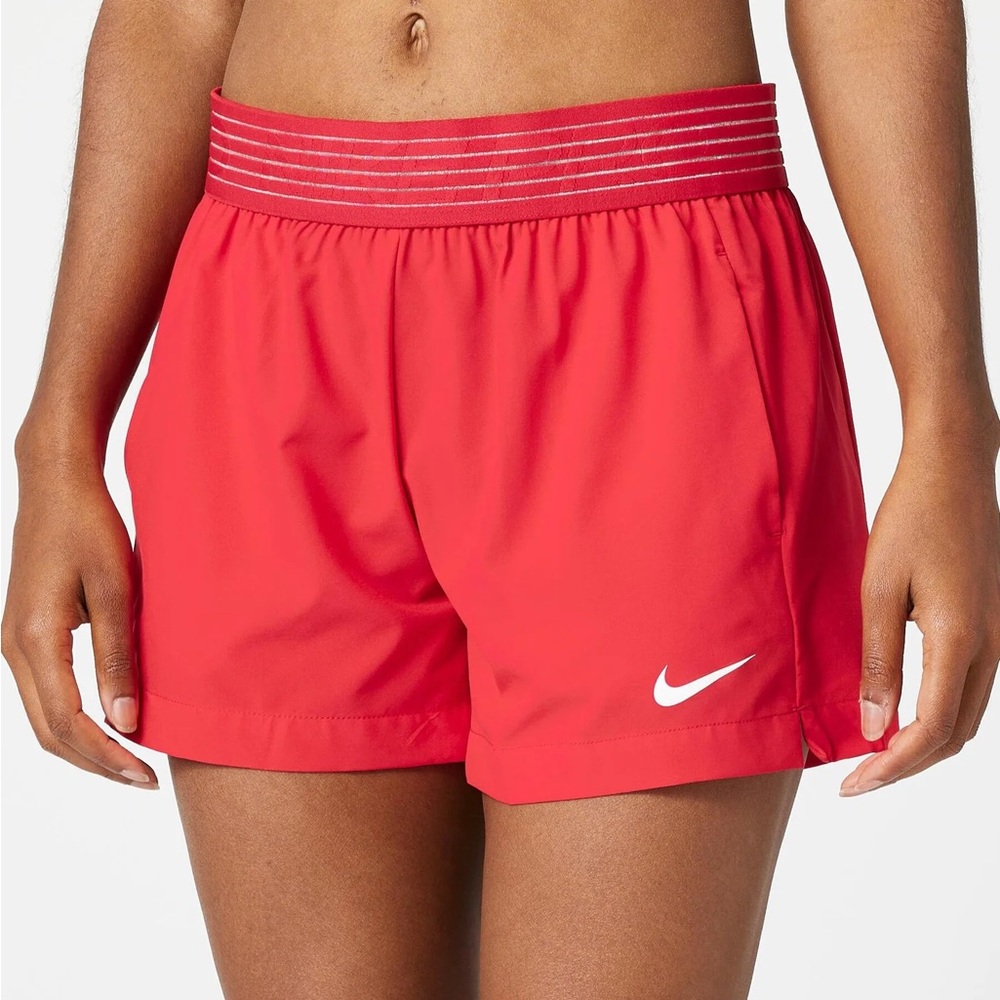 Red Nike shorts